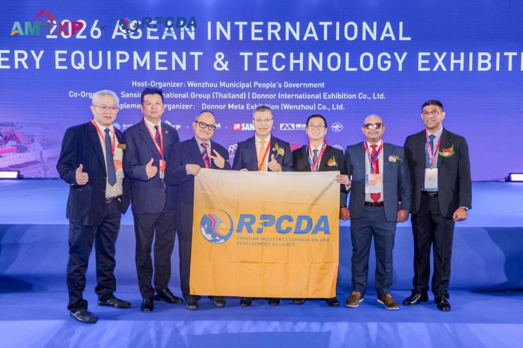 Group photo beneath the RPCDA banner at AMTXP 2026